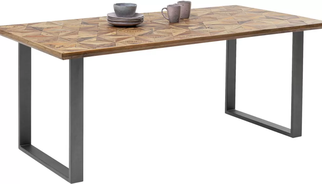Table Stars par KARE Design - Métal brut au style industriel, dimensions 180 x 90 cm  
Surface robuste avec finition texturée, idéale pour espaces contemporains  
Design épuré alliant caractère brut et esthétique intemporelle